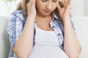 болит голова при беременности на ранних сроках